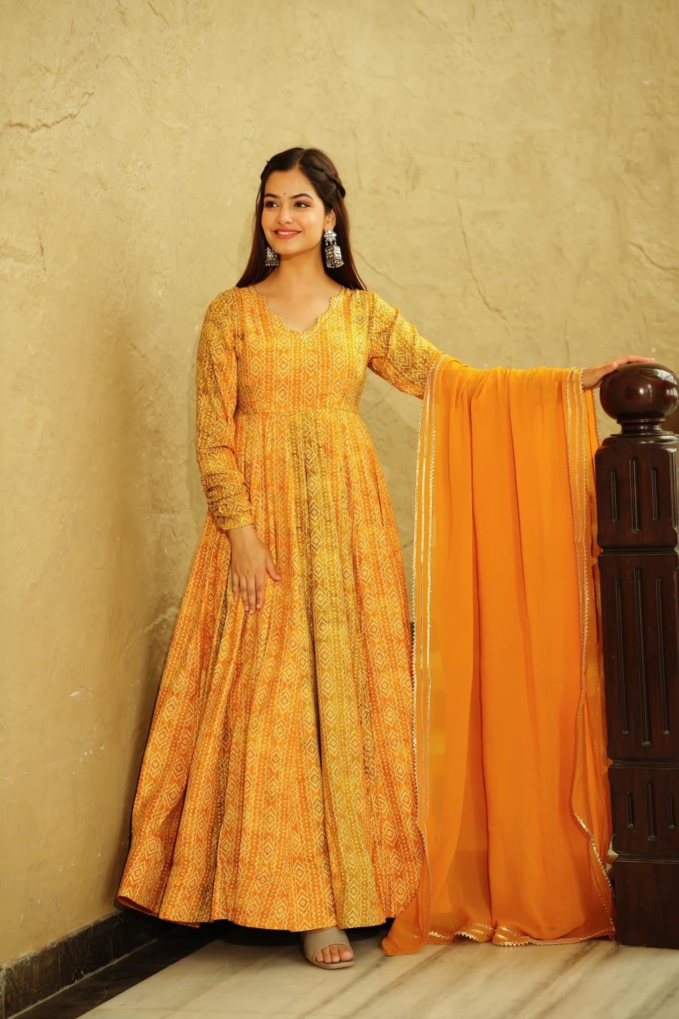 Beautiful and Stylish Full Flair Gown for Women In Yellow Color